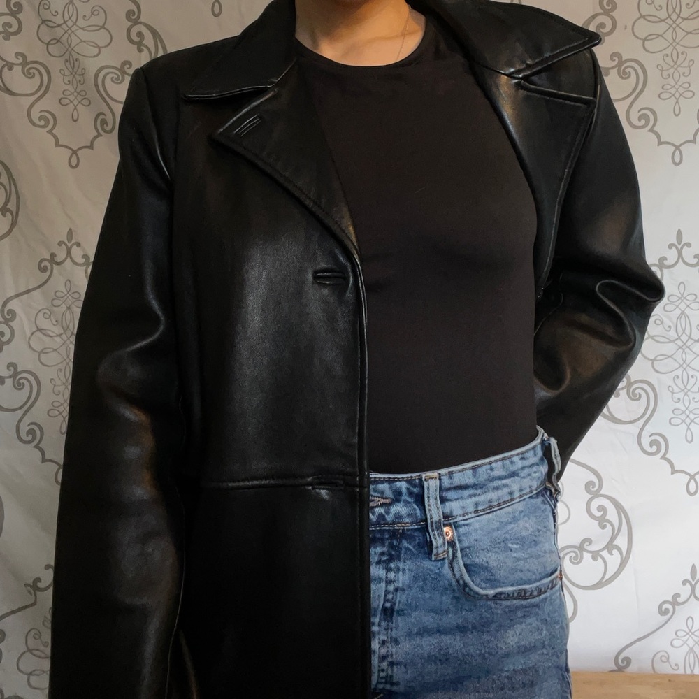 Black genuine leather long jacket. Fully lined.